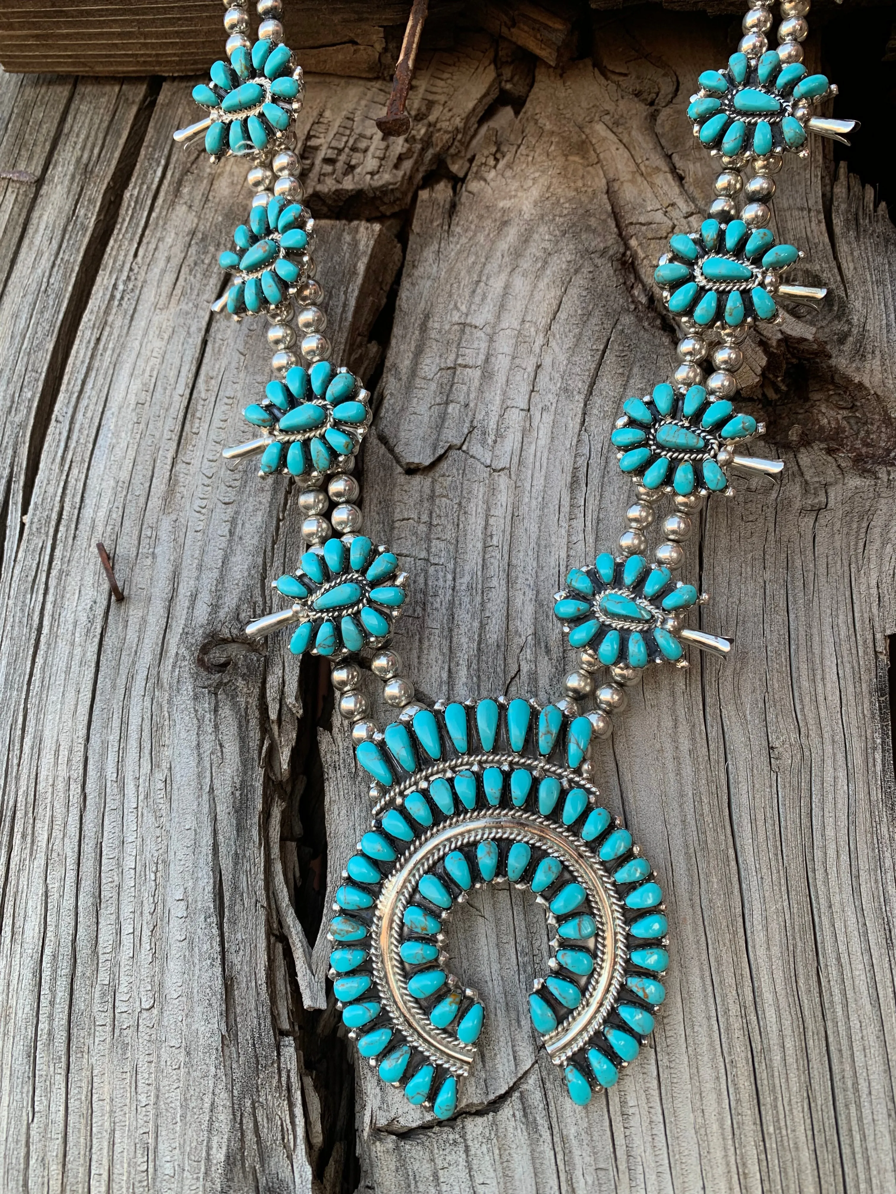 A Squash Blossom necklace & earring set